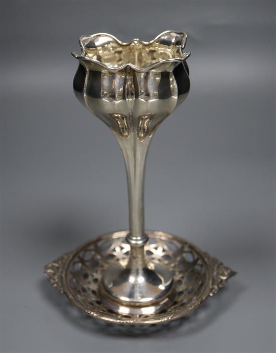 An Edwardian silver tulip vase, 18.1cm, weighted and a small silver bonbon dish.